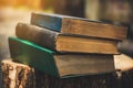 Vintage books, antiques, vintage books, dark table still life with retro books on a dark background. Royalty Free Stock Photo