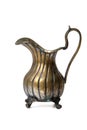 Ancient brass ewer on white