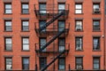 Ancient brick buildings with fire stairs  in New York City Royalty Free Stock Photo