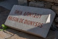 Ancient brick with inscription `House of Dionysus`