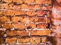 Ancient brick wall with plaster. Shabby surface of ancient masonry. Royalty Free Stock Photo