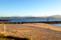 Old Stone Bridge on a Beach in Santander. Spain. Royalty Free Stock Photo