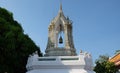 Ancient bronze bell from a Buddhist monastery. Little Asian bell tower Royalty Free Stock Photo