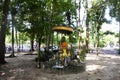 Ancient buddha and antique deity old angel in garden park of Wat Khuan Maphrao temple for thai people travelers travel visit and Royalty Free Stock Photo