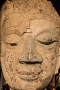 Ancient Buddha face statue Royalty Free Stock Photo
