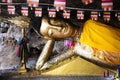 Ancient buddha reclining statue in antique stone cave of Wat Khao Phra Si Sanphet Chayaram temple for thai people travelers travel