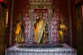 Ancient buddha statue and antique footprint of buddha in ubosot for thai people travel visit respect praying blessing wish mystery