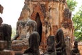 Ancient buddha statue in archaeological site at Wat Mahathat temple . old sculpture in history is a world heritage