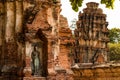 Ancient buddha statue in archaeological site at Wat Mahathat temple . old sculpture in history is a world heritage Royalty Free Stock Photo