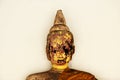 Ancient buddha statue damaged at Prasat Nakhon Luang
