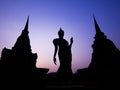 Ancient Buddha Statue and Pagodas at Twilight, Sukhothai Province, Thailand