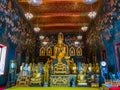 Ancient Buddha statue in Thailand with mural painting around. Royalty Free Stock Photo
