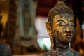 Ancient Buddha statue at Wat Visoun in Luang Prabang, Laos, Southeast Asia