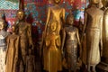 Ancient Buddha statues, Wat Xieng Thong temple, in Luang Prabang, Laos Royalty Free Stock Photo