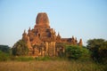 Ancient Buddhist pagoda Tha Kya Pone in the light of the morning sun. Bagan, Myanmar