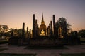 The ancient Buddhist temple of Wat Sa Si in evening twilight. H