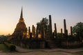 The ancient Buddhist temple of Wat Sa Si in evening twilight. H