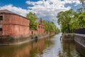 Ancient building in Kronstadt on the banks of the Bypass channel, Russia Royalty Free Stock Photo