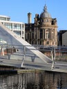 Ancient building and modern bridge on the River Clyde Royalty Free Stock Photo