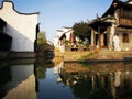 Ancient building reflecting on the peaceful river Royalty Free Stock Photo