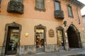 Ancient building with shops in the historic center of Busto Arsizio