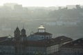 Ancient buildings in the center of old Porto downtown in the background light. Royalty Free Stock Photo