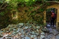 Ancient buildings in a forest being re-claimed by nature