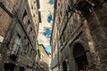 Ancient buildings in a narrow street in Siena