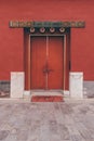 The ancient buildings with red wall, yellow or gray tile roof, door gate in the Forbidden City, Beijing, China Royalty Free Stock Photo