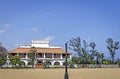 Ancient bungalow with vintage lamp post near Danish fort in Tranquebar, Tamil Nadu, India Royalty Free Stock Photo