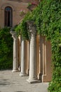 Ancient byzantine columns in the park. Royalty Free Stock Photo