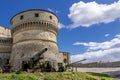 Ancient cannons protect the fortress of the rocca di San Leo on a sunny day, Rimini, Italy