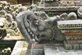 Ancient carved elephant gargoyle at a temple in Bali Indonesia