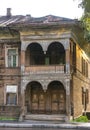 Ancient carved wooden two-storey house with balcony, Vologda, Russia