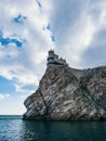 Ancient Castle on cliff of Crimea seashore Shallow Nest, famous tourist place of Yalta Royalty Free Stock Photo