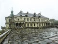 ancient castle in rainy weather shrouded in clouds