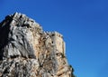 Ancient castle on a rock, space for text Royalty Free Stock Photo