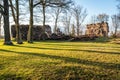 Ancient Castle Wall Ruins on Sunny Day with Green Grass Field Royalty Free Stock Photo