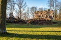 Ancient Castle Wall Ruins on Sunny Day with Green Grass Field Royalty Free Stock Photo