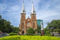The ancient Cathedral of Notre Dame De Saigon in the urban landscape. Ho Chi Minh City, Vietnam Royalty Free Stock Photo