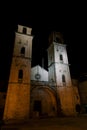 Ancient Cathedral of St. Tryphon at night by the light of lanterns. Kotor, Montenegro