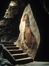 Ancient Cave Art Preserved Painting on a Rock Formation with Stone Steps Royalty Free Stock Photo