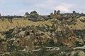 Ancient cave dwellings carved into the soft rock formations of Cappadocia Royalty Free Stock Photo