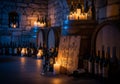 Ancient Cellar Illuminated by Candlelight and Wine Royalty Free Stock Photo