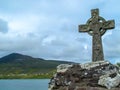 Celtic Cross over looking Mountain and Water Royalty Free Stock Photo