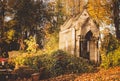 Ancient chapel on the cemetery on sunny autumn afternoon. Royalty Free Stock Photo