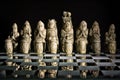 Ancient Chess Set on Glass Board Royalty Free Stock Photo