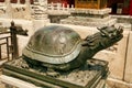 Bronze turtle sitting on a pedestal in the Forbidden City in Beijing. Royalty Free Stock Photo