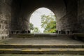 Ancient Chinese arched stone gate in cloudy winter afternoon