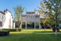 Archway building on green meadow